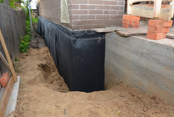 Happy homeowners after waterproofing job in Tracy City